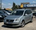 Сірий Фольксваген Туран, об'ємом двигуна 2 л та пробігом 215 тис. км за 7600 $, фото 1 на Automoto.ua