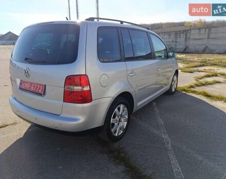 Серый Фольксваген Туран, объемом двигателя 1.6 л и пробегом 243 тыс. км за 5999 $, фото 2 на Automoto.ua