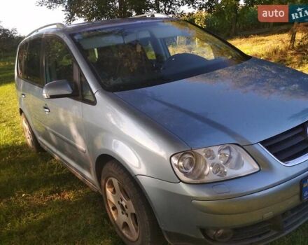 Серый Фольксваген Туран, объемом двигателя 1.39 л и пробегом 200 тыс. км за 5500 $, фото 4 на Automoto.ua