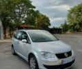 Сірий Фольксваген Туран, об'ємом двигуна 1.4 л та пробігом 217 тис. км за 5900 $, фото 1 на Automoto.ua