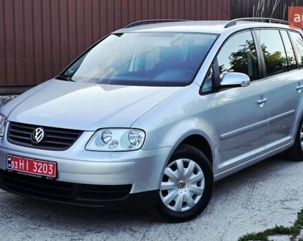 Серый Фольксваген Туран, объемом двигателя 1.6 л и пробегом 270 тыс. км за 6499 $, фото 2 на Automoto.ua