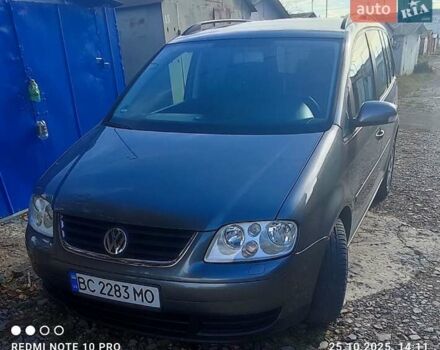 Серый Фольксваген Туран, объемом двигателя 2 л и пробегом 181 тыс. км за 4900 $, фото 2 на Automoto.ua