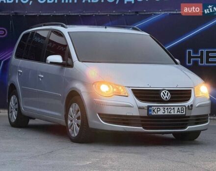 Серый Фольксваген Туран, объемом двигателя 1.39 л и пробегом 211 тыс. км за 6799 $, фото 3 на Automoto.ua