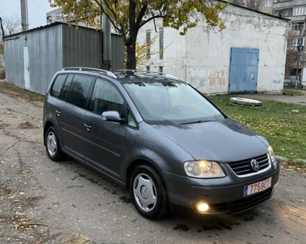 Серый Фольксваген Туран, объемом двигателя 2 л и пробегом 320 тыс. км за 3400 $, фото 5 на Automoto.ua