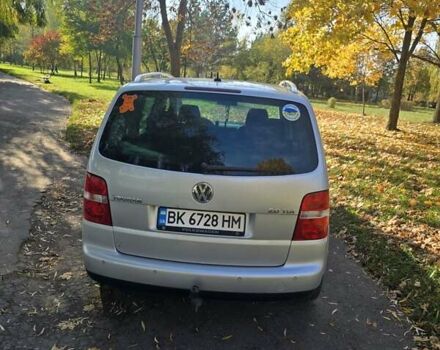 Серый Фольксваген Туран, объемом двигателя 2 л и пробегом 370 тыс. км за 6200 $, фото 2 на Automoto.ua