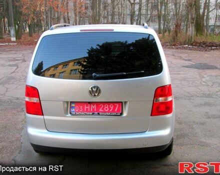 Серый Фольксваген Туран, объемом двигателя 1.6 л и пробегом 230 тыс. км за 6500 $, фото 2 на Automoto.ua