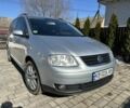 Сірий Фольксваген Туран, об'ємом двигуна 1.4 л та пробігом 194 тис. км за 4900 $, фото 1 на Automoto.ua