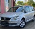 Сірий Фольксваген Туран, об'ємом двигуна 2 л та пробігом 200 тис. км за 1800 $, фото 1 на Automoto.ua