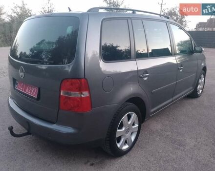 Серый Фольксваген Туран, объемом двигателя 1.6 л и пробегом 215 тыс. км за 5900 $, фото 6 на Automoto.ua