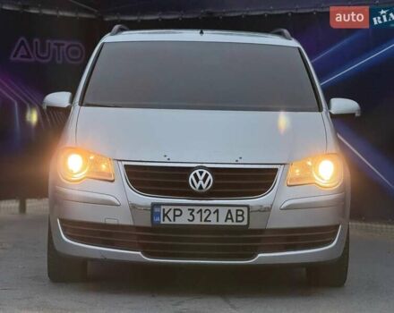 Серый Фольксваген Туран, объемом двигателя 1.39 л и пробегом 211 тыс. км за 6799 $, фото 2 на Automoto.ua