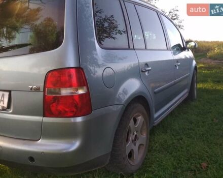 Серый Фольксваген Туран, объемом двигателя 1.39 л и пробегом 200 тыс. км за 5500 $, фото 2 на Automoto.ua