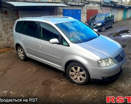 Серый Фольксваген Туран, объемом двигателя 2 л и пробегом 231 тыс. км за 7500 $, фото 1 на Automoto.ua