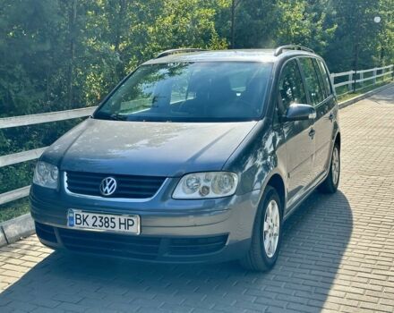 Серый Фольксваген Туран, объемом двигателя 2 л и пробегом 330 тыс. км за 5800 $, фото 3 на Automoto.ua