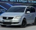 Сірий Фольксваген Туран, об'ємом двигуна 1.4 л та пробігом 211 тис. км за 6299 $, фото 1 на Automoto.ua