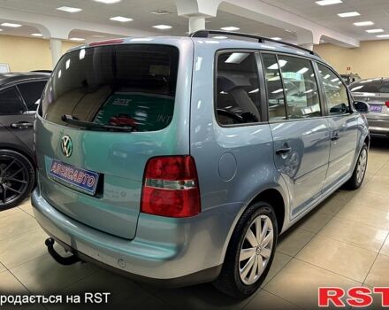 Серый Фольксваген Туран, объемом двигателя 1.6 л и пробегом 213 тыс. км за 6600 $, фото 2 на Automoto.ua