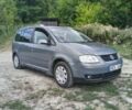 Сірий Фольксваген Туран, об'ємом двигуна 2 л та пробігом 330 тис. км за 3300 $, фото 1 на Automoto.ua