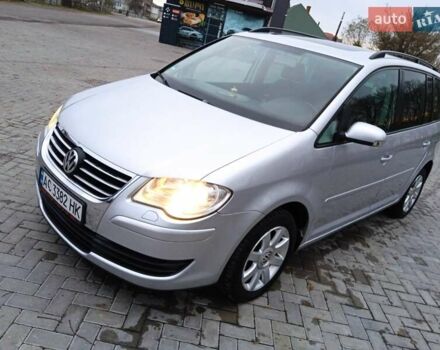 Сірий Фольксваген Туран, об'ємом двигуна 1.39 л та пробігом 243 тис. км за 5350 $, фото 4 на Automoto.ua