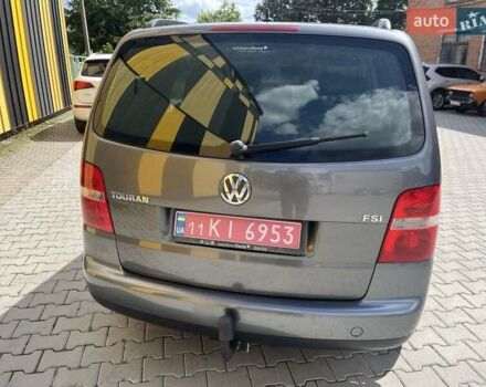 Серый Фольксваген Туран, объемом двигателя 1.6 л и пробегом 186 тыс. км за 6900 $, фото 2 на Automoto.ua