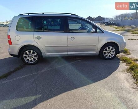 Серый Фольксваген Туран, объемом двигателя 1.6 л и пробегом 243 тыс. км за 5999 $, фото 1 на Automoto.ua