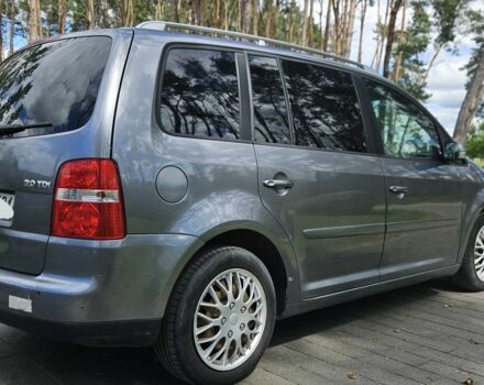 Серый Фольксваген Туран, объемом двигателя 2 л и пробегом 367 тыс. км за 2657 $, фото 2 на Automoto.ua
