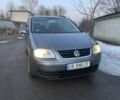 Серый Фольксваген Туран, объемом двигателя 1.6 л и пробегом 267 тыс. км за 5500 $, фото 1 на Automoto.ua