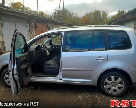 Серый Фольксваген Туран, объемом двигателя 2 л и пробегом 231 тыс. км за 7500 $, фото 2 на Automoto.ua