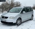 Серый Фольксваген Туран, объемом двигателя 1.9 л и пробегом 312 тыс. км за 2999 $, фото 1 на Automoto.ua