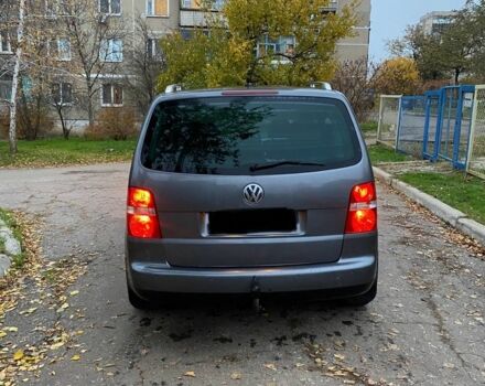 Серый Фольксваген Туран, объемом двигателя 2 л и пробегом 320 тыс. км за 3400 $, фото 3 на Automoto.ua
