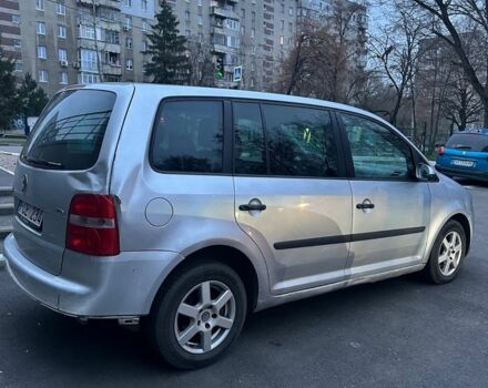 Серый Фольксваген Туран, объемом двигателя 2 л и пробегом 350 тыс. км за 2499 $, фото 2 на Automoto.ua