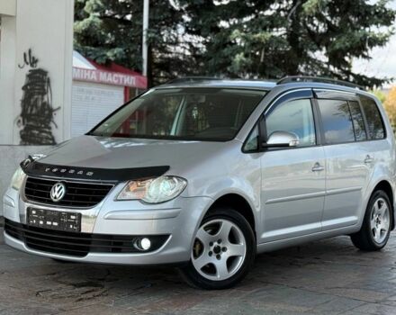 Серый Фольксваген Туран, объемом двигателя 2 л и пробегом 260 тыс. км за 5300 $, фото 1 на Automoto.ua