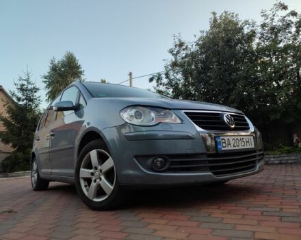 Серый Фольксваген Туран, объемом двигателя 1.4 л и пробегом 246 тыс. км за 6900 $, фото 1 на Automoto.ua