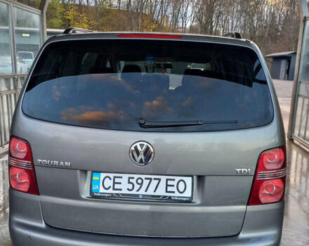 Серый Фольксваген Туран, объемом двигателя 1.9 л и пробегом 250 тыс. км за 7700 $, фото 2 на Automoto.ua