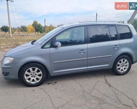 Серый Фольксваген Туран, объемом двигателя 1.4 л и пробегом 209 тыс. км за 6500 $, фото 1 на Automoto.ua