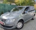 Сірий Фольксваген Туран, об'ємом двигуна 1.4 л та пробігом 215 тис. км за 5900 $, фото 1 на Automoto.ua