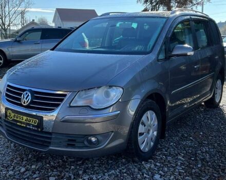 Серый Фольксваген Туран, объемом двигателя 1.4 л и пробегом 242 тыс. км за 7000 $, фото 2 на Automoto.ua