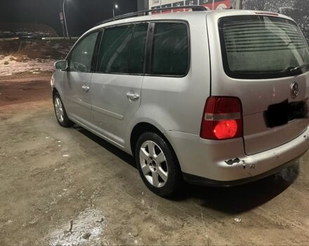 Серый Фольксваген Туран, объемом двигателя 1.9 л и пробегом 300 тыс. км за 1950 $, фото 3 на Automoto.ua