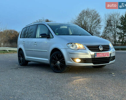 Сірий Фольксваген Туран, об'ємом двигуна 1.4 л та пробігом 248 тис. км за 7500 $, фото 1 на Automoto.ua