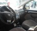 Серый Фольксваген Туран, объемом двигателя 2 л и пробегом 2 тыс. км за 6500 $, фото 1 на Automoto.ua