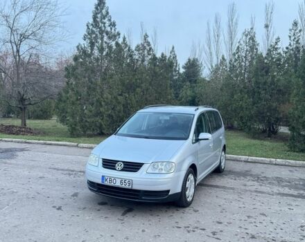 Серый Фольксваген Туран, объемом двигателя 1.9 л и пробегом 250 тыс. км за 3450 $, фото 1 на Automoto.ua