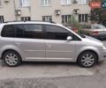 Серый Фольксваген Туран, объемом двигателя 1.97 л и пробегом 260 тыс. км за 7500 $, фото 1 на Automoto.ua