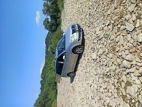 Серый Фольксваген Туран, объемом двигателя 1 л и пробегом 34 тыс. км за 5900 $, фото 2 на Automoto.ua