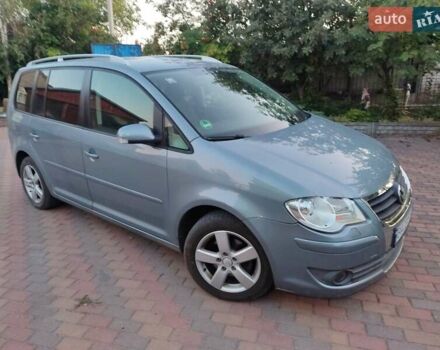 Сірий Фольксваген Туран, об'ємом двигуна 1.4 л та пробігом 246 тис. км за 6900 $, фото 4 на Automoto.ua