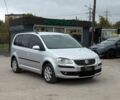 Сірий Фольксваген Туран, об'ємом двигуна 2 л та пробігом 187 тис. км за 9195 $, фото 1 на Automoto.ua