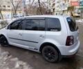 Серый Фольксваген Туран, объемом двигателя 1.39 л и пробегом 219 тыс. км за 4850 $, фото 3 на Automoto.ua