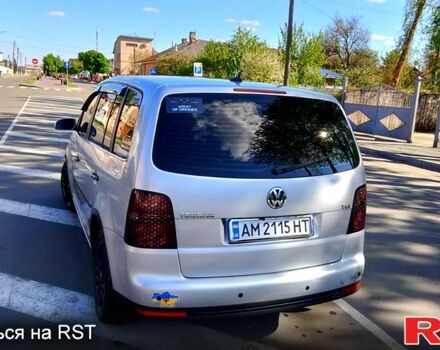 Серый Фольксваген Туран, объемом двигателя 1.4 л и пробегом 214 тыс. км за 5100 $, фото 2 на Automoto.ua