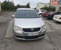 Серый Фольксваген Туран, объемом двигателя 1.97 л и пробегом 260 тыс. км за 7500 $, фото 1 на Automoto.ua