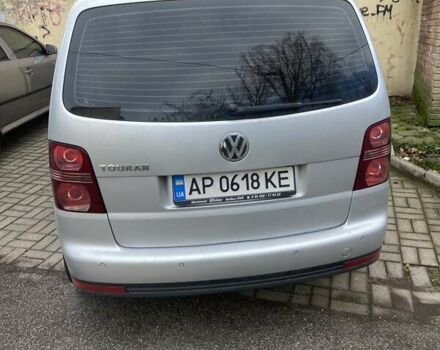 Серый Фольксваген Туран, объемом двигателя 1.4 л и пробегом 202 тыс. км за 5500 $, фото 2 на Automoto.ua