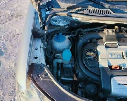 Серый Фольксваген Туран, объемом двигателя 1.4 л и пробегом 203 тыс. км за 7200 $, фото 2 на Automoto.ua