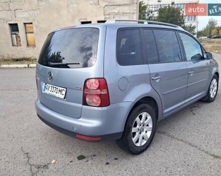 Серый Фольксваген Туран, объемом двигателя 1.4 л и пробегом 209 тыс. км за 6500 $, фото 4 на Automoto.ua