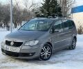 Сірий Фольксваген Туран, об'ємом двигуна 2 л та пробігом 231 тис. км за 2999 $, фото 1 на Automoto.ua